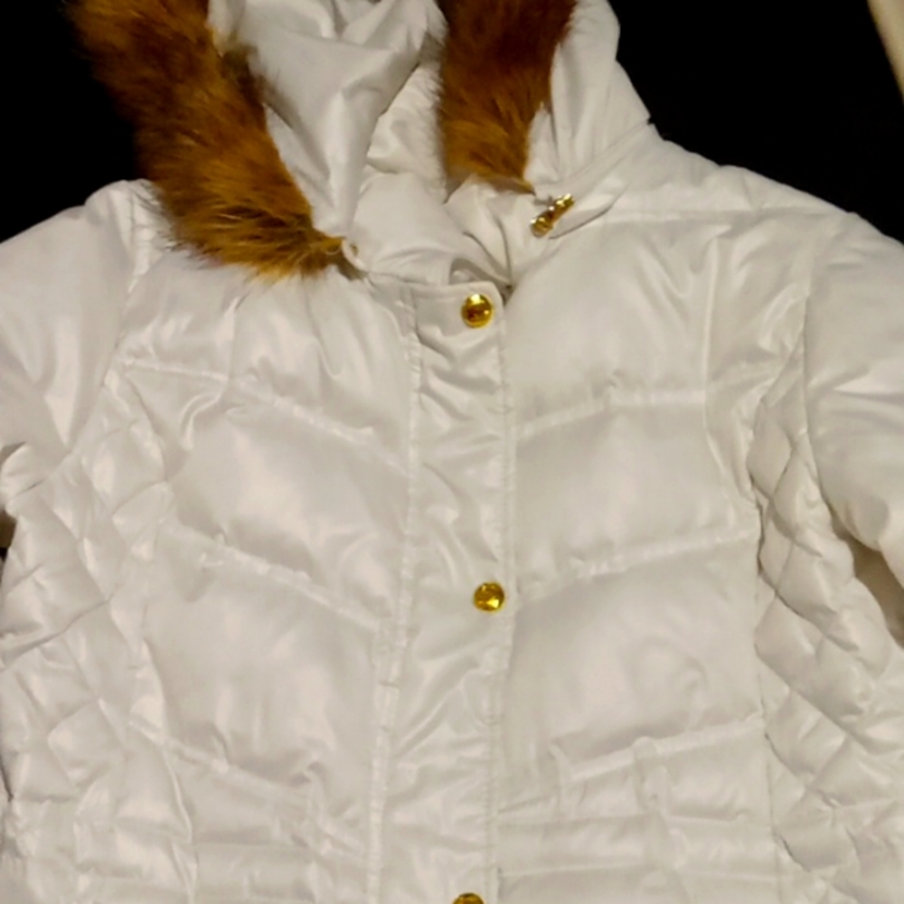 A fullength guess puffer  coat